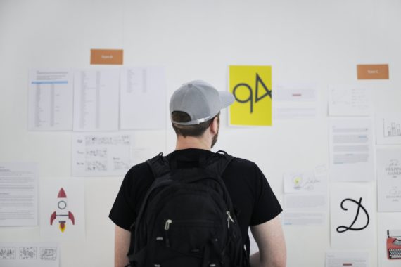 Startup Business People Looking on Strategy Board Information Thoughtful